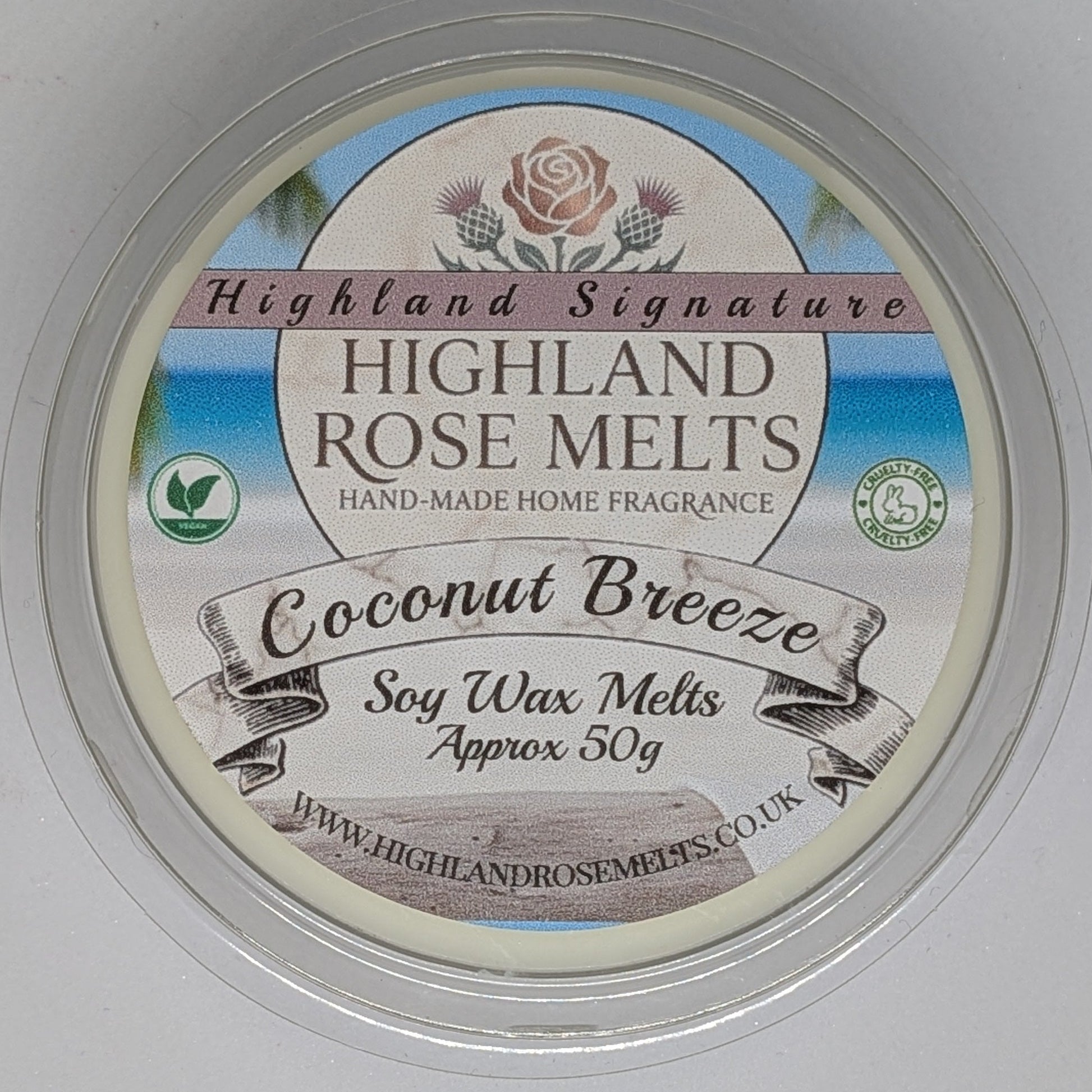 Container of Highland Rose Melts coconut breeze soy wax melts with label