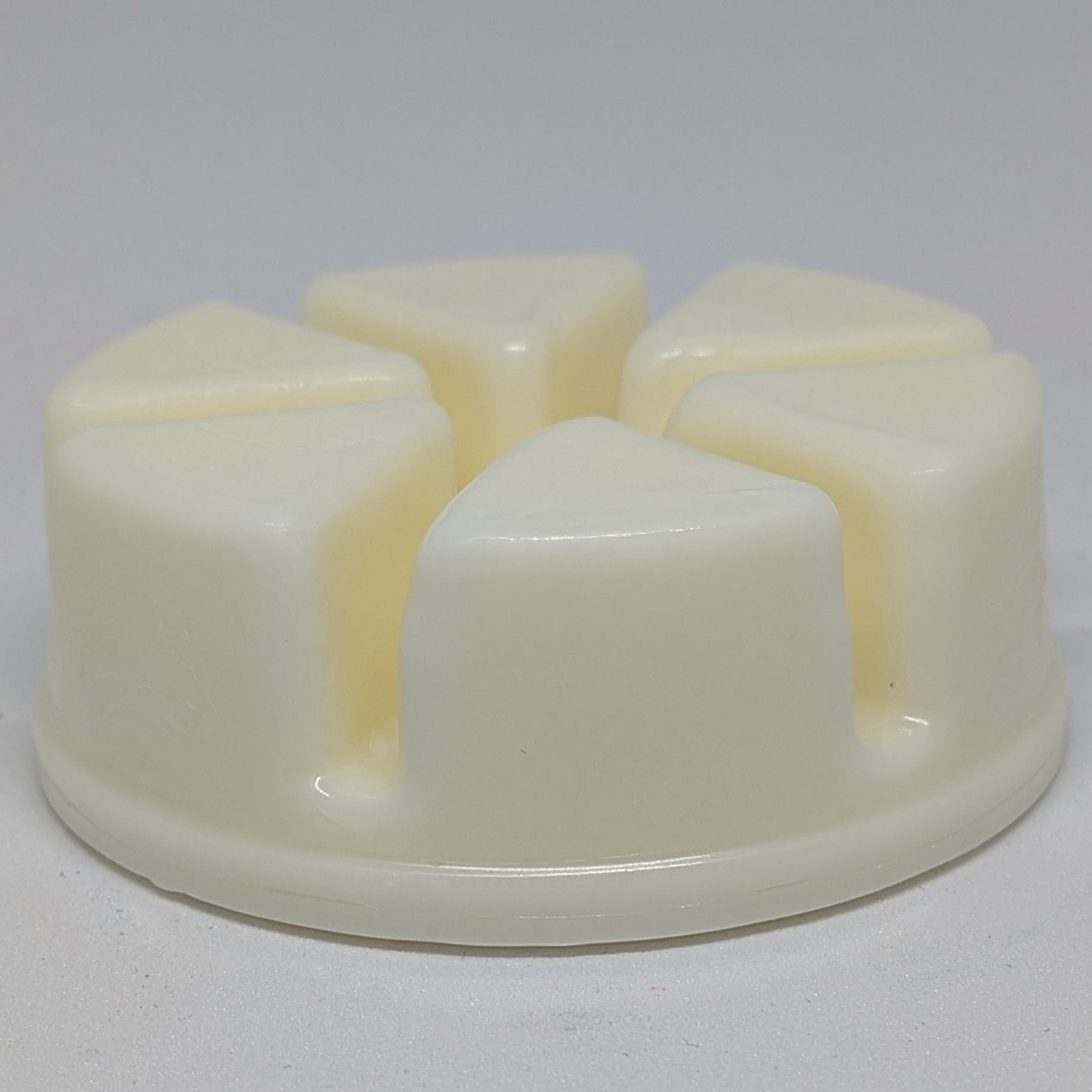 Close up, side shot of wax melt coconut breeze by Highland Rose Melts